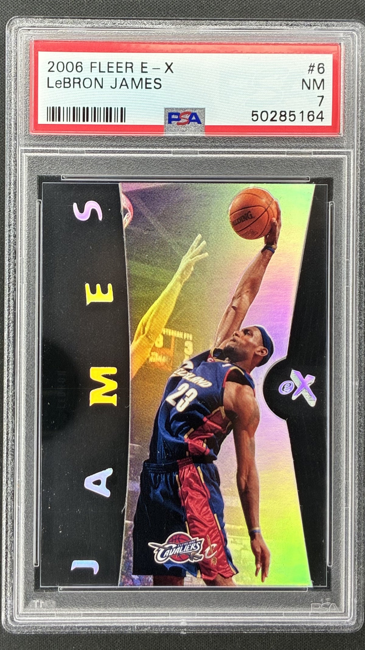 2006-07 Fleer E-X LeBron James #6 PSA 7 NM Cleveland Cavaliers basketball card.