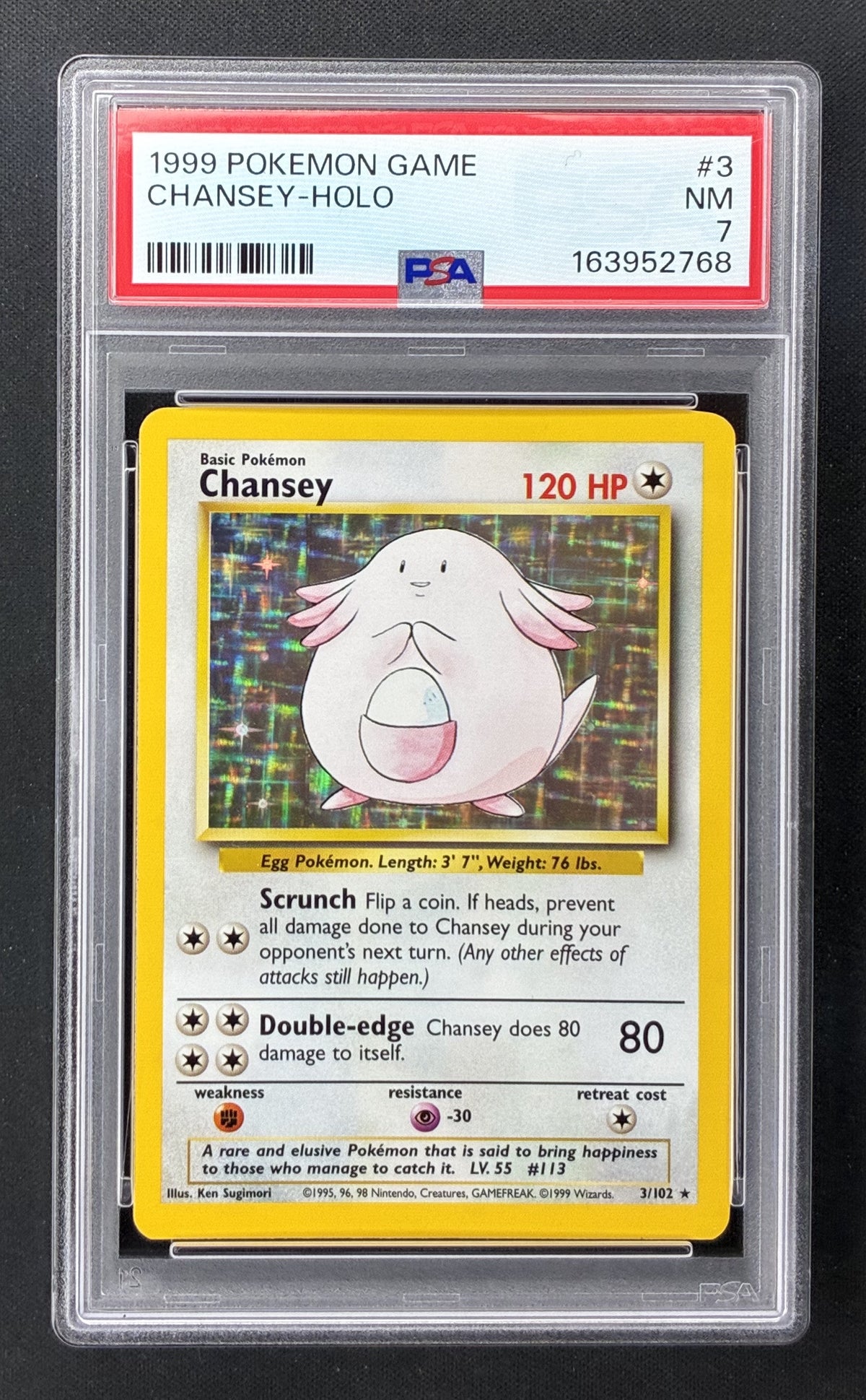 1999 Pokémon Base Set Chansey Holo 3/102 English PSA 7 Near Mint.