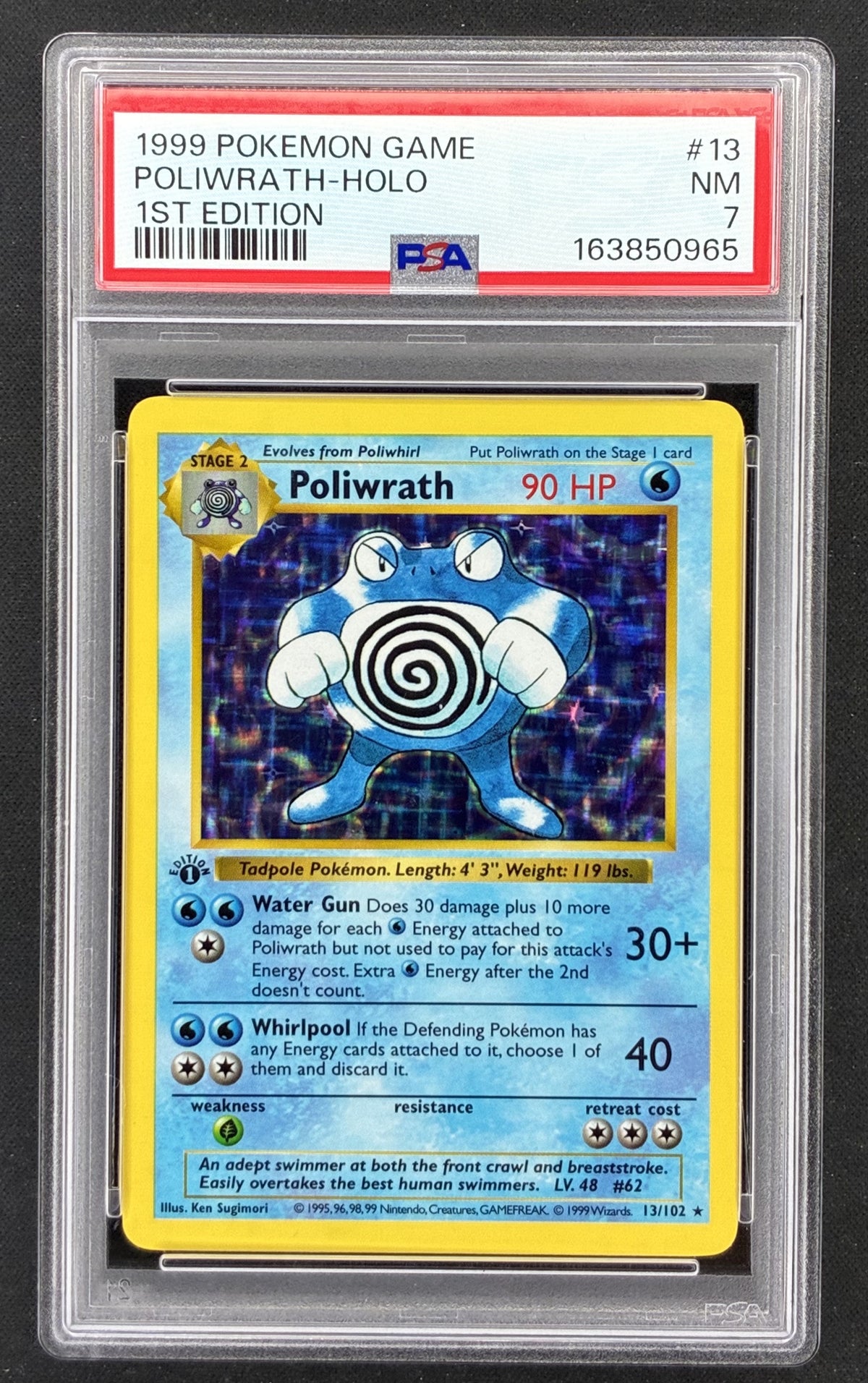 1999 Pokémon Base Set 1st Edition Shadowless Poliwrath 13/102 holographic card illustrated by Ken Sugimori, graded PSA 7 Near Mint.