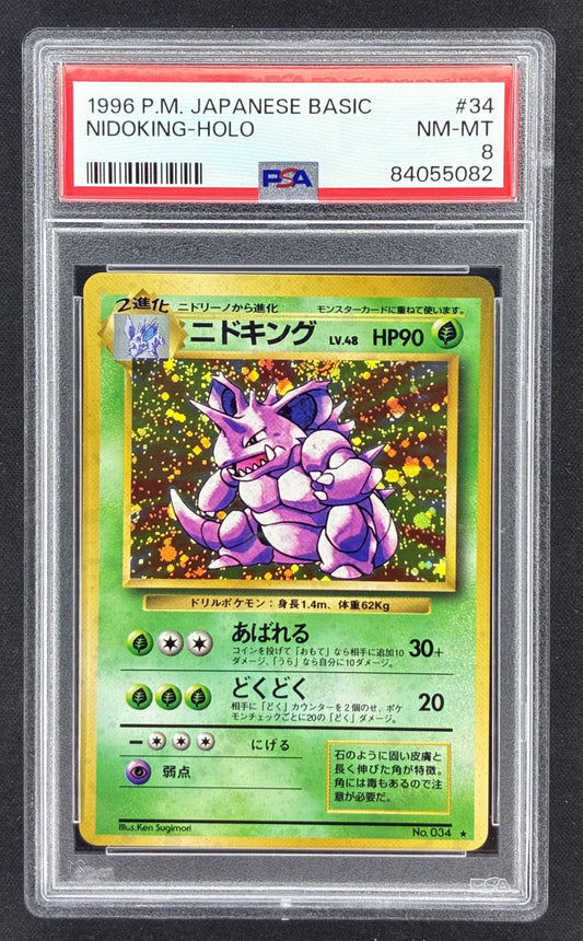 1996 Japanese Pokémon Base Set Nidoking No.034 holographic trading card featuring original Ken Sugimori artwork, professionally graded PSA 8 Near Mint-Mint.