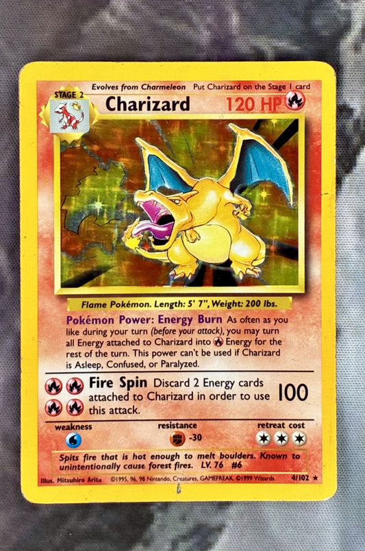 Charizard 4/102 Base Set Unlimited Holo Pokémon Card – Heavily Played (HP)