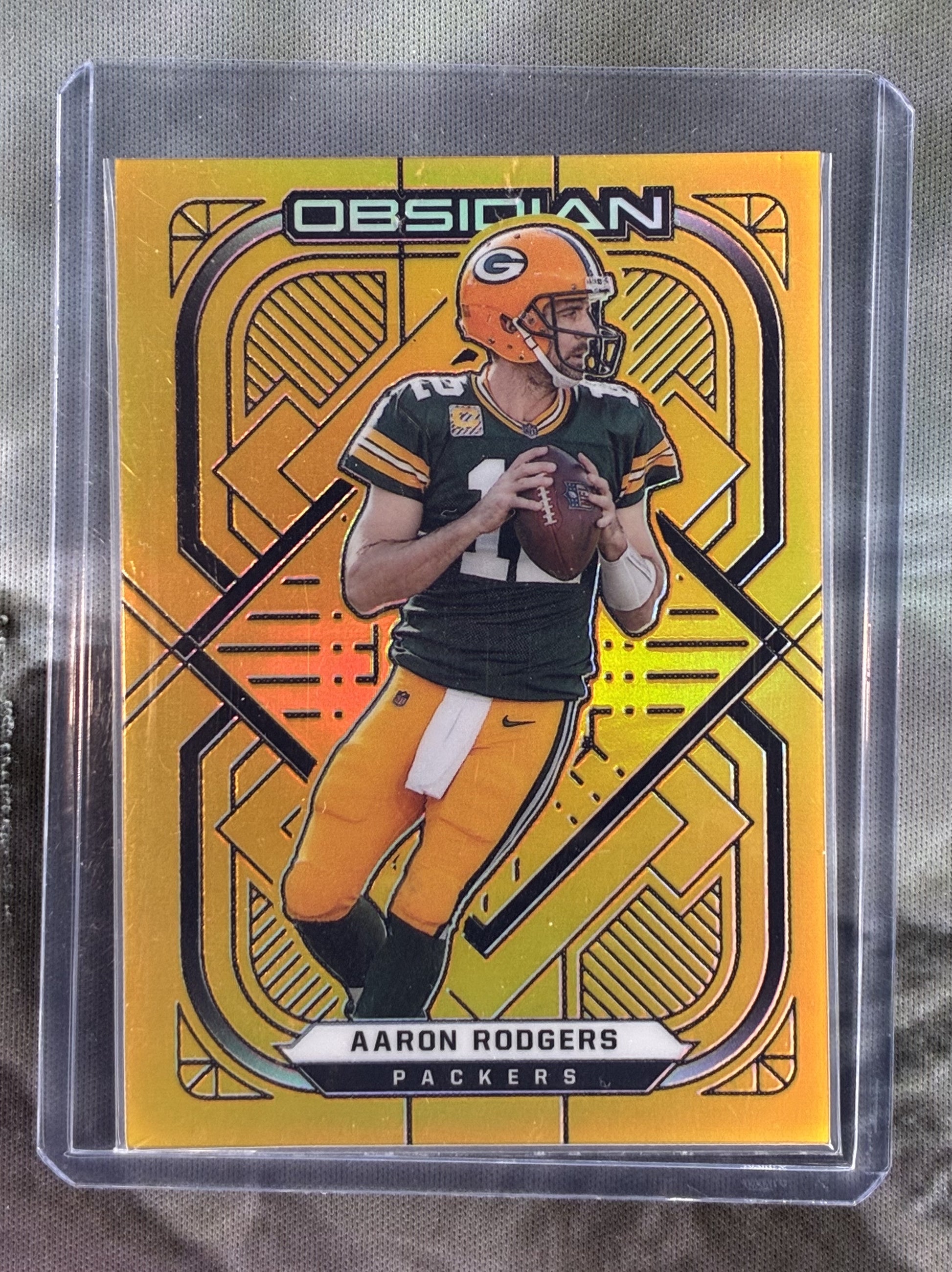 2021 Obsidian Electric Etch Gold Flood Aaron Rodgers 7/10 Football Card