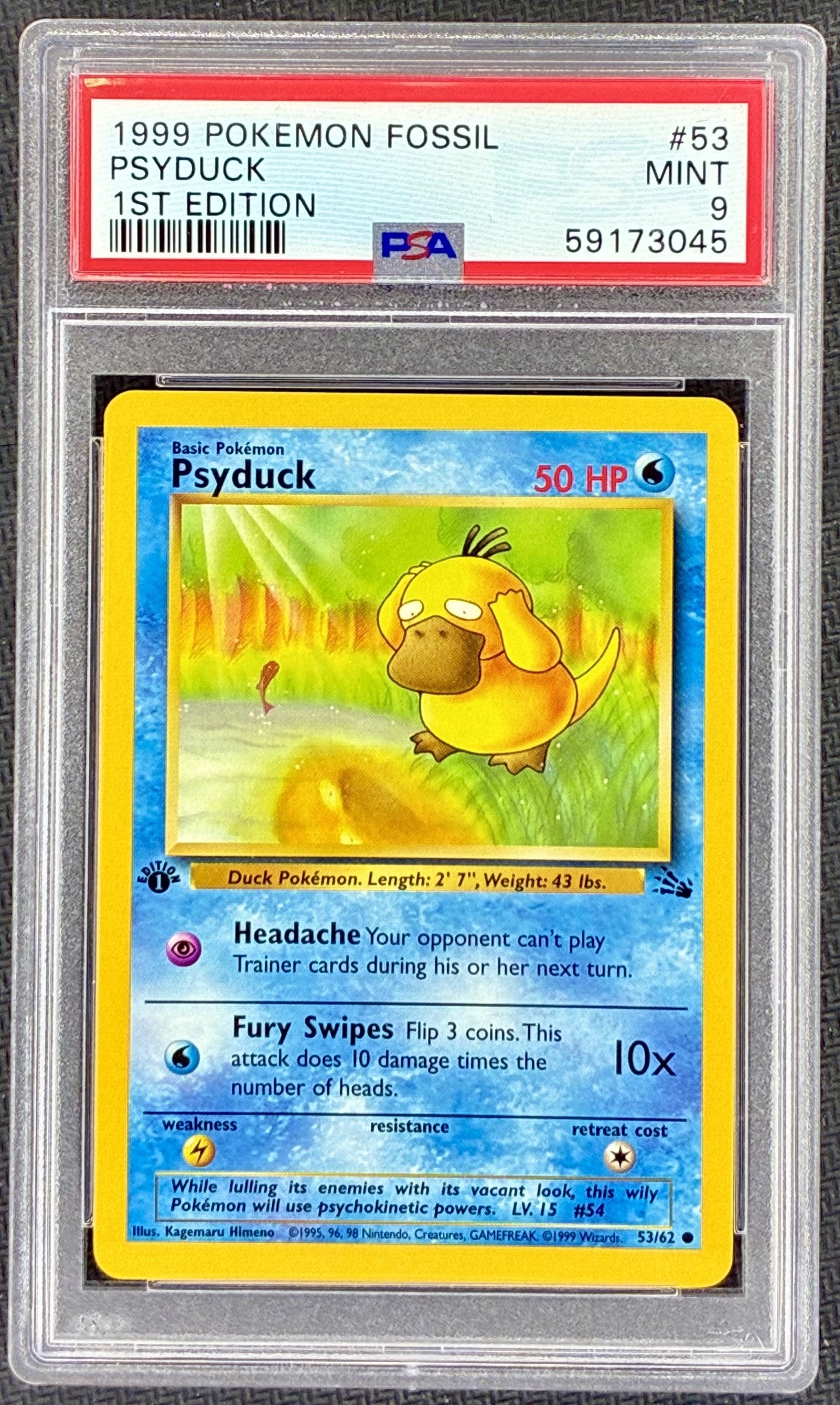 PSA 9 Psyduck 1999 Pokémon Fossil 1st Edition #53/62 Vintage Pokémon Card