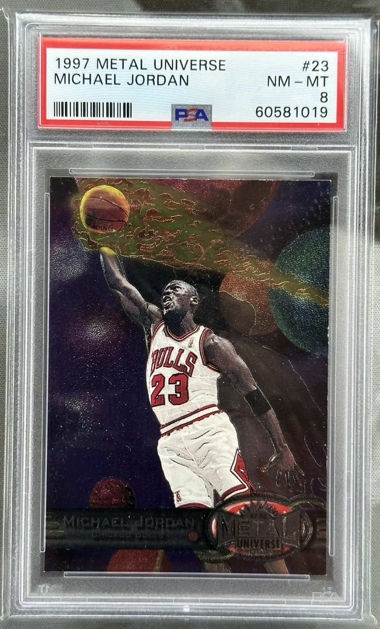1997 Metal Universe Michael Jordan #23 PSA 8 Near Mint–Mint graded basketball card